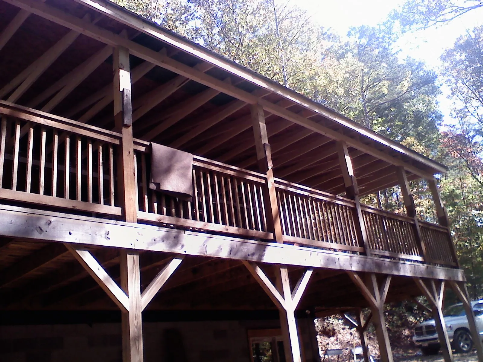 Timber framing under a new elevated porch and deck — Roof Leak Repair in Dow City by Roofing Brothers